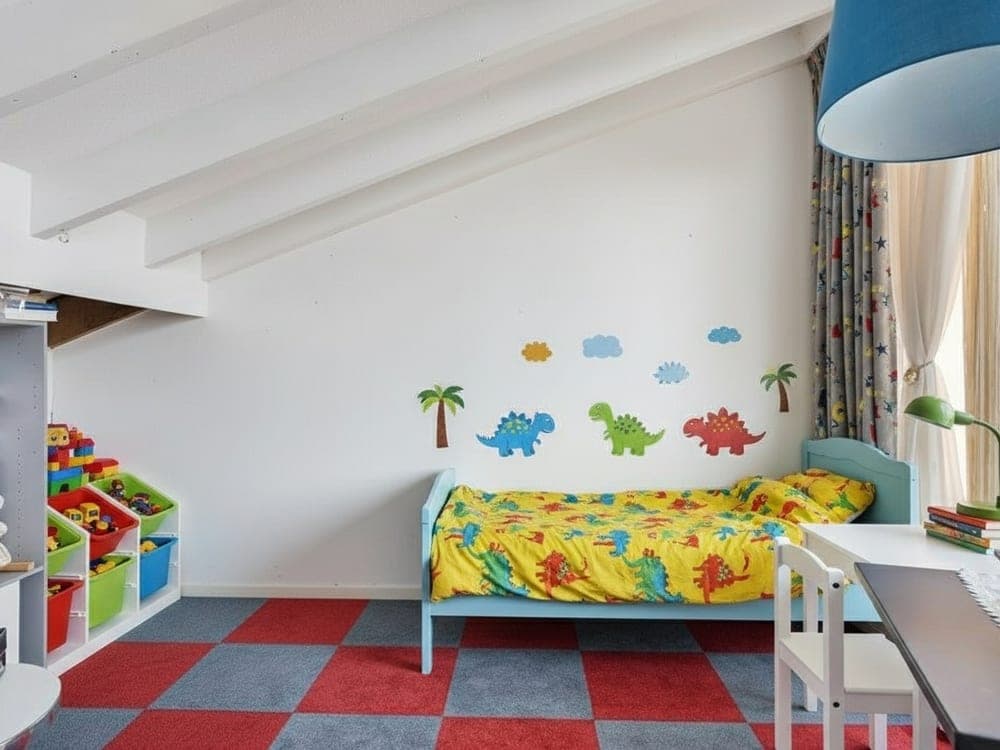 A storage-filled attic room, decluttered and staged as a kids' room. Same carpet, same ceiling.