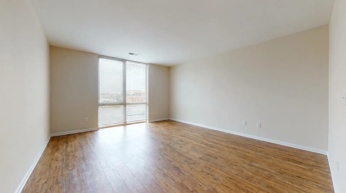 Empty plain apartment living room before styling