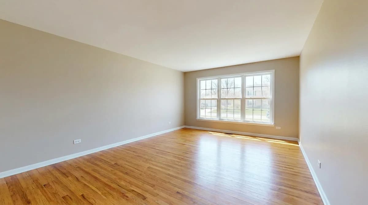 Empty unfurnished living room before virtual staging
