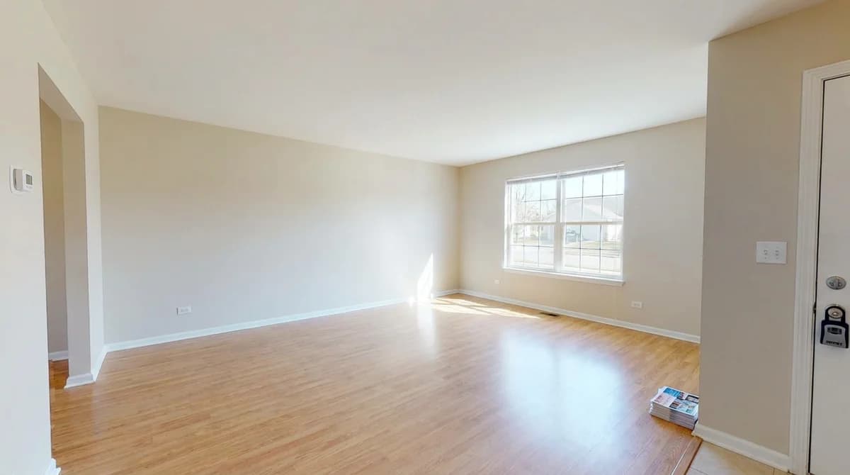 Empty unfurnished living room before virtual staging